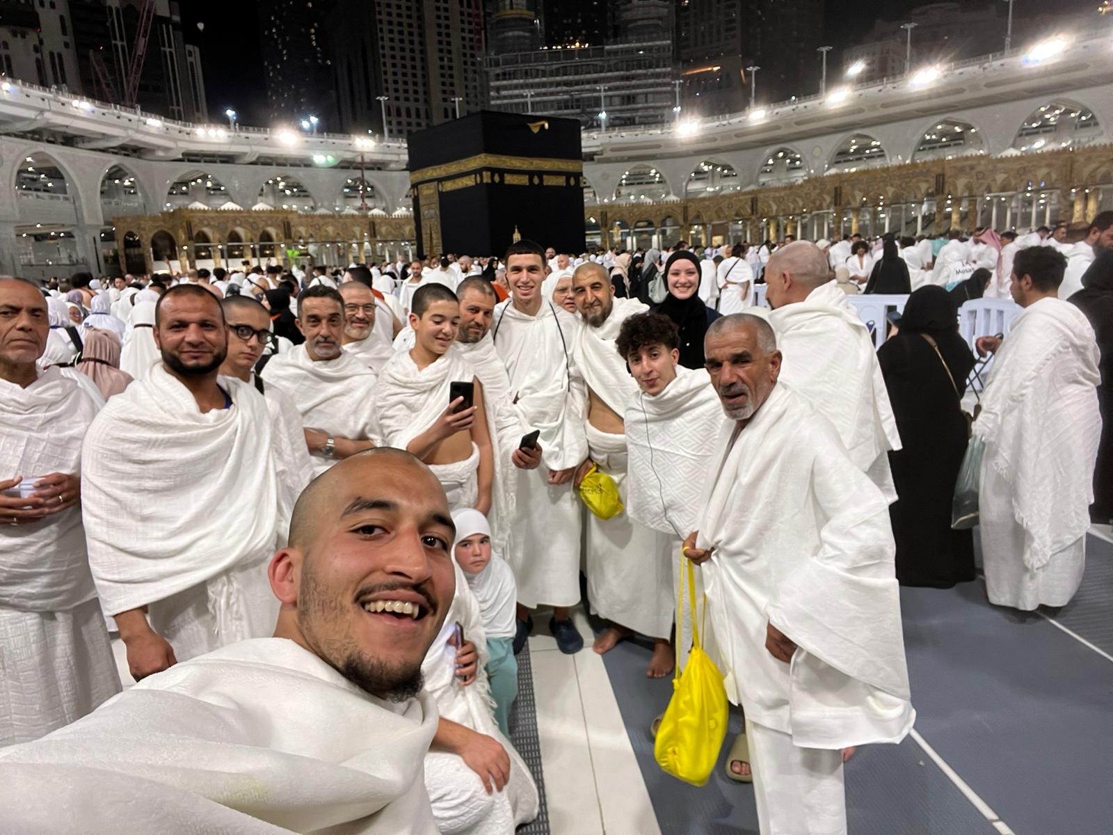 Group selfie at the Kaaba